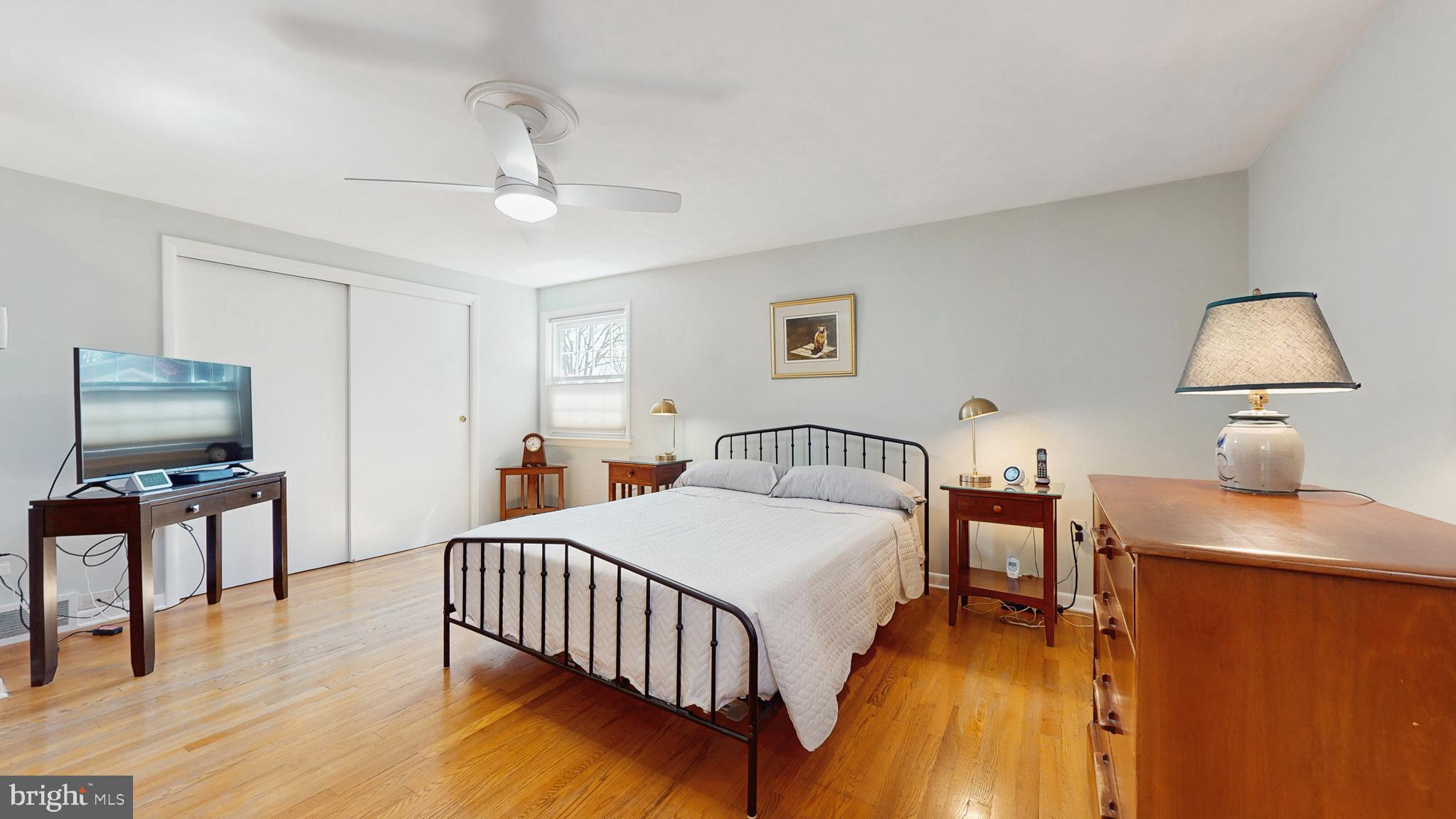 27 Farm Road Ewing, NJ 08638 - Photo 20 of 47 a bedroom with a bed and a flat screen tv