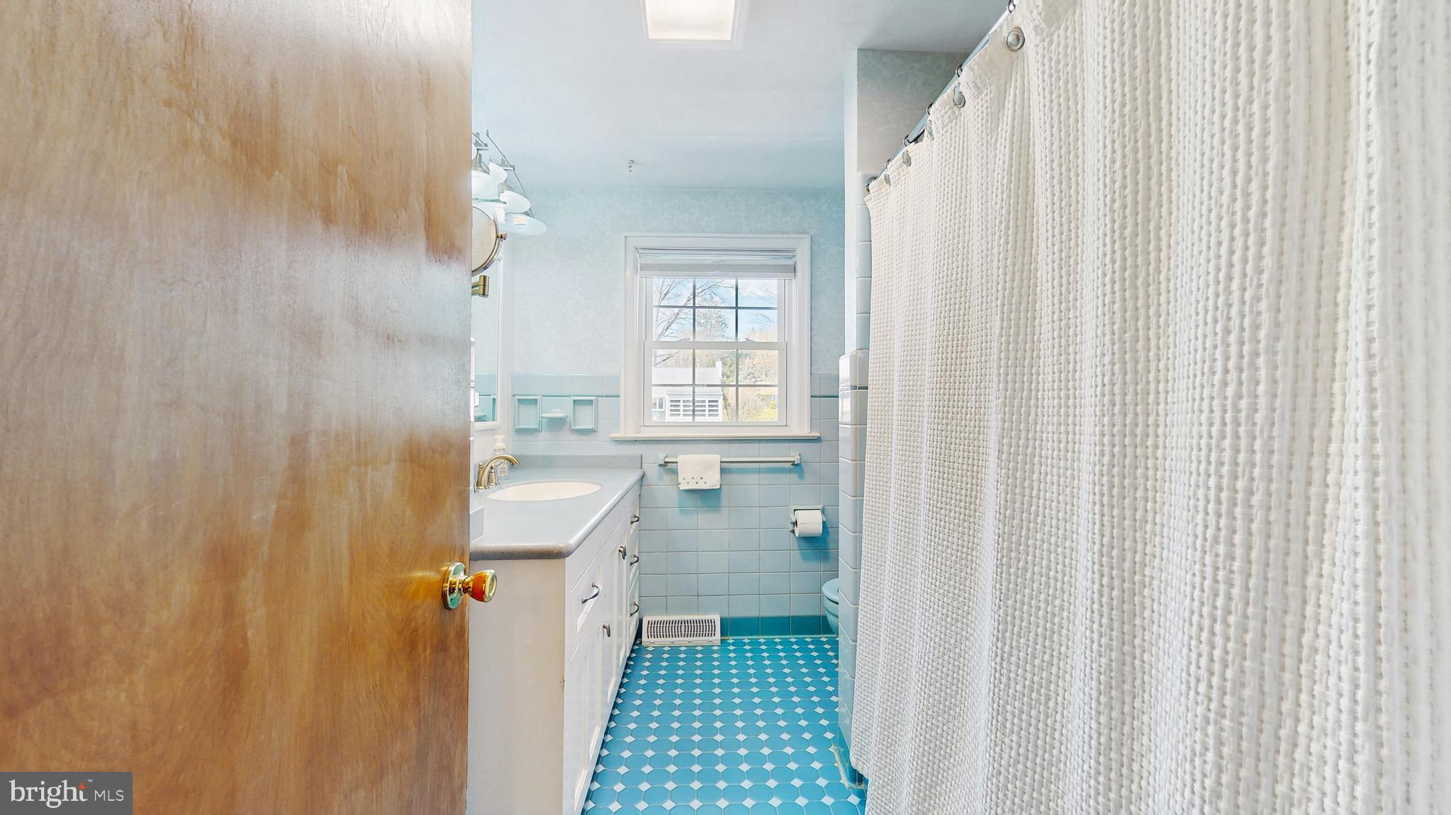 27 Farm Road Ewing, NJ 08638 - Photo 23 of 47 a bathroom with a sink a toilet and shower