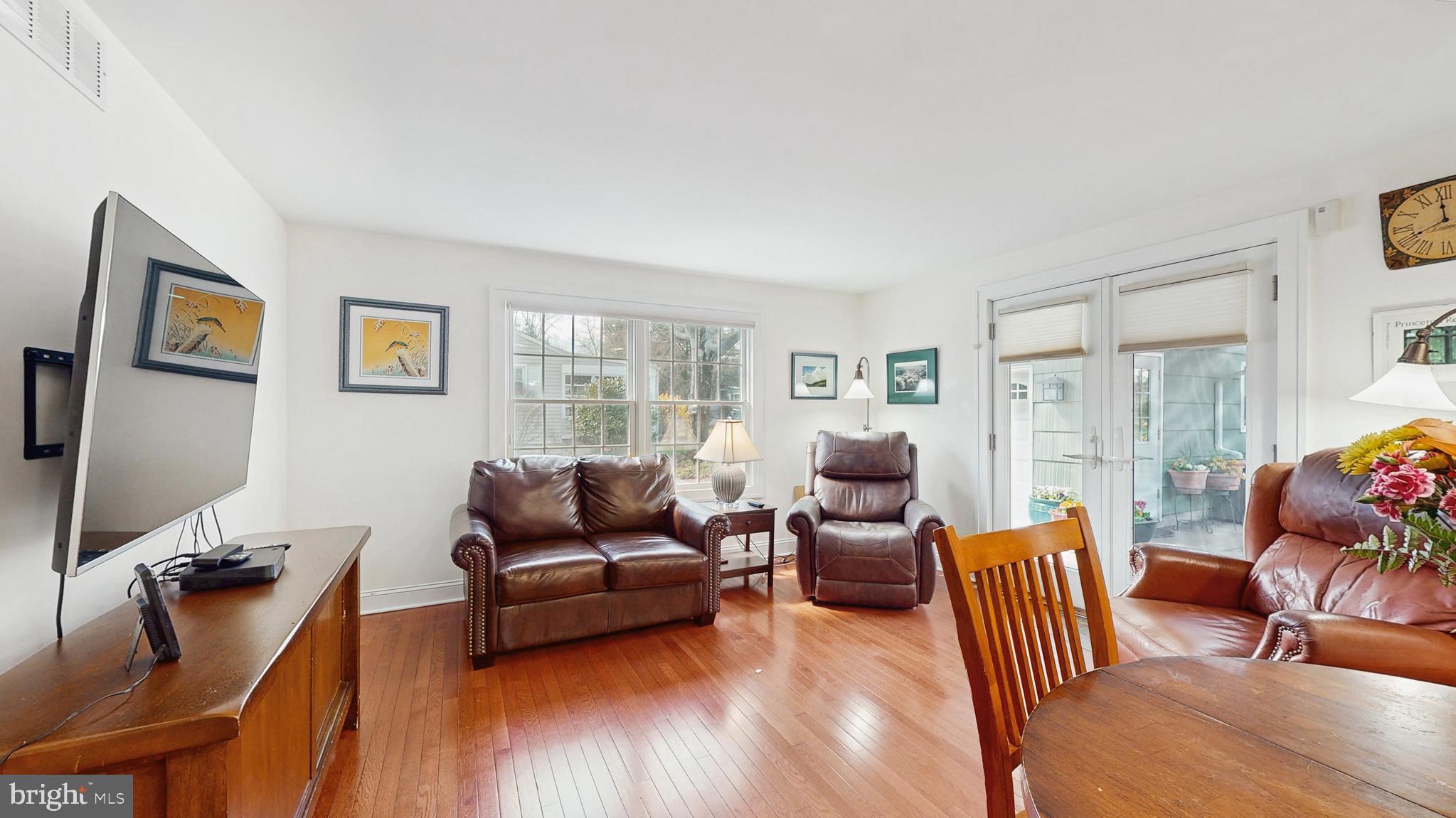 27 Farm Road Ewing, NJ 08638 - Photo 30 of 47 a living room with furniture and a flat screen tv