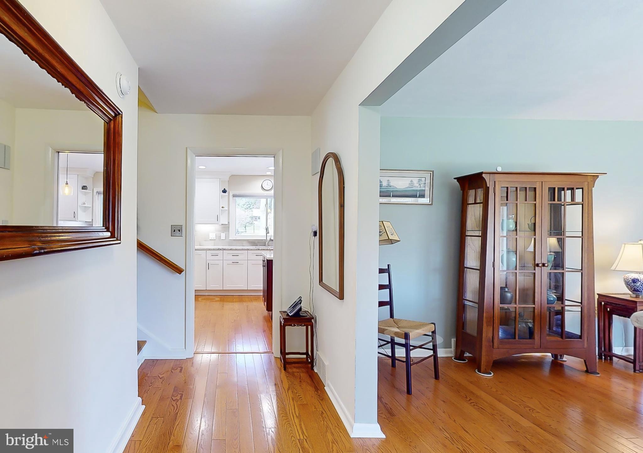 27 Farm Road Ewing, NJ 08638 - Photo 3 of 47 a living room with furniture and a wooden floor