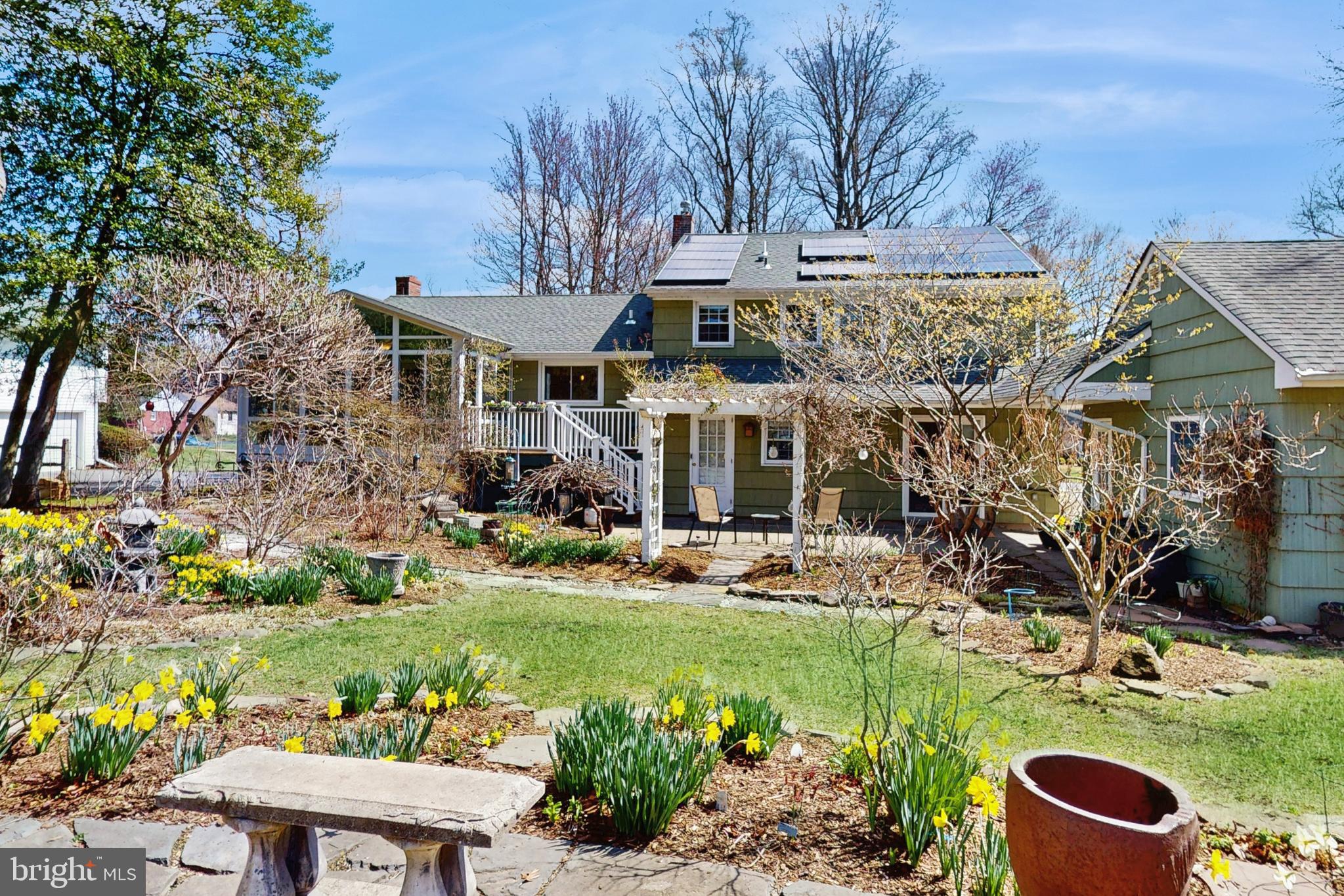 27 Farm Road Ewing, NJ 08638 - Photo 37 of 47 a view of a house with garden and sitting area