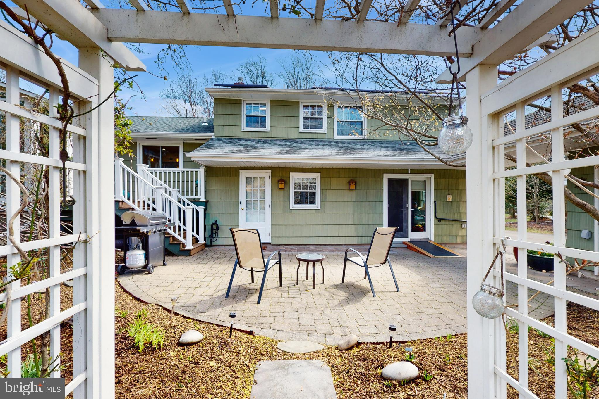 27 Farm Road Ewing, NJ 08638 - Photo 39 of 47 a front view of a building with outdoor seating