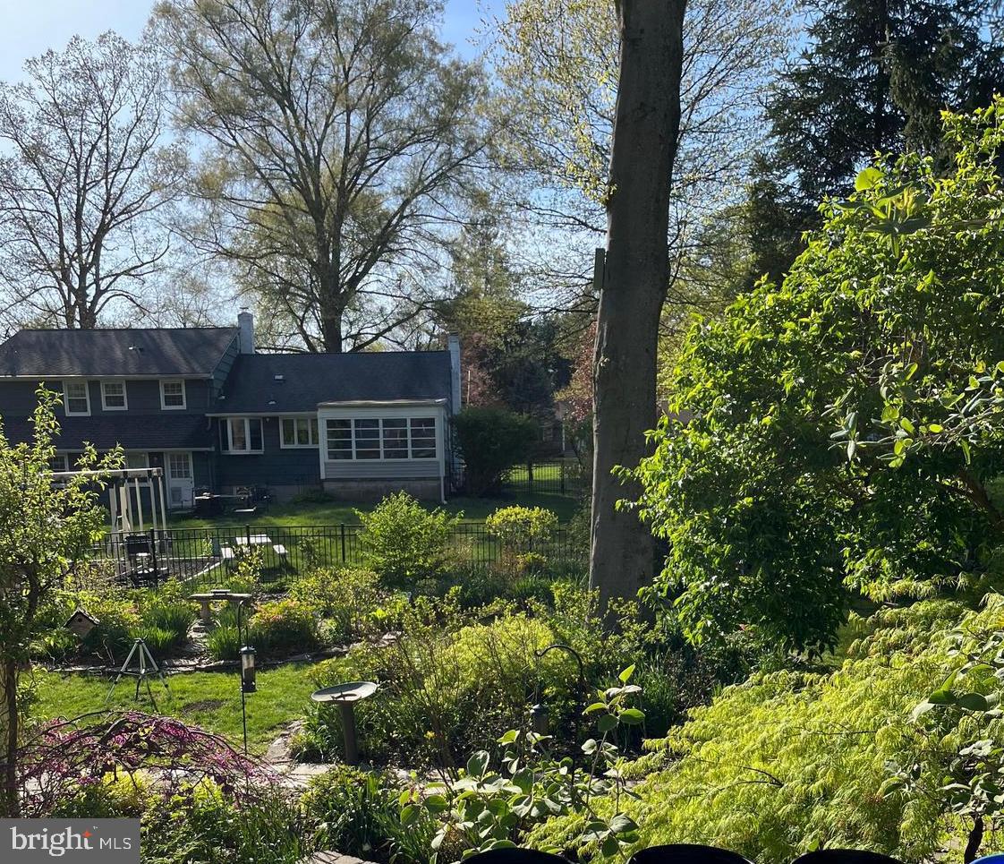 27 Farm Road Ewing, NJ 08638 - Photo 44 of 47 a view of a house with a yard and garden