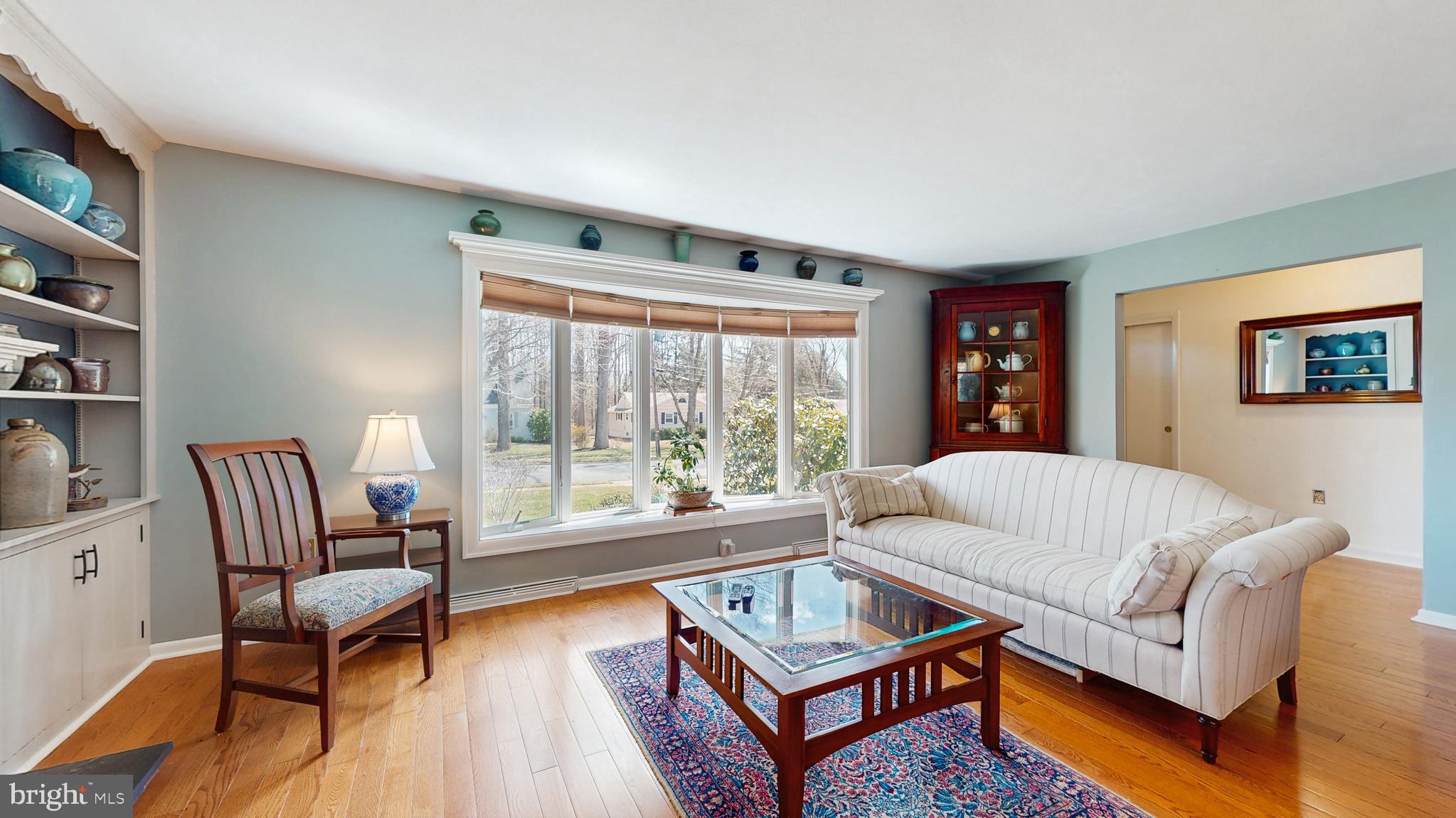 27 Farm Road Ewing, NJ 08638 - Photo 6 of 47 a living room with furniture and a large window