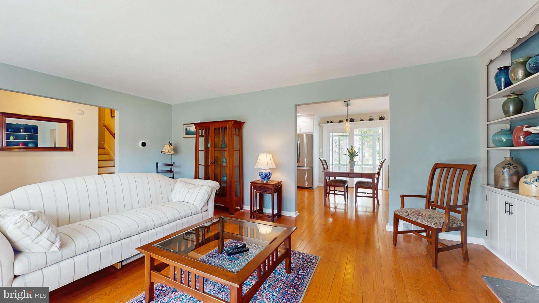 27 Farm Road Ewing, NJ 08638 - Photo 7 of 47 a living room with furniture and a wooden floor