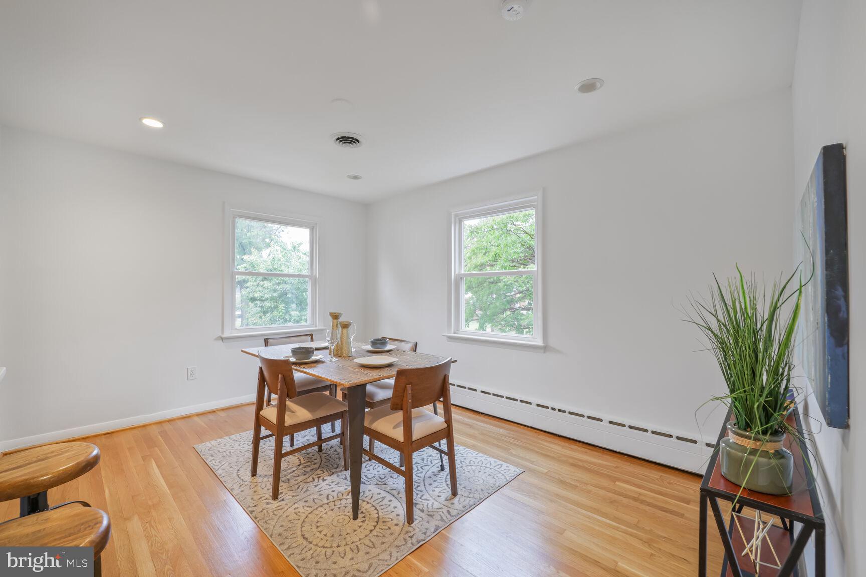 4609 22nd Avenue Mount Rainier, MD 20712 - Photo 6 of 33 a workspace with furniture window and wooden floor