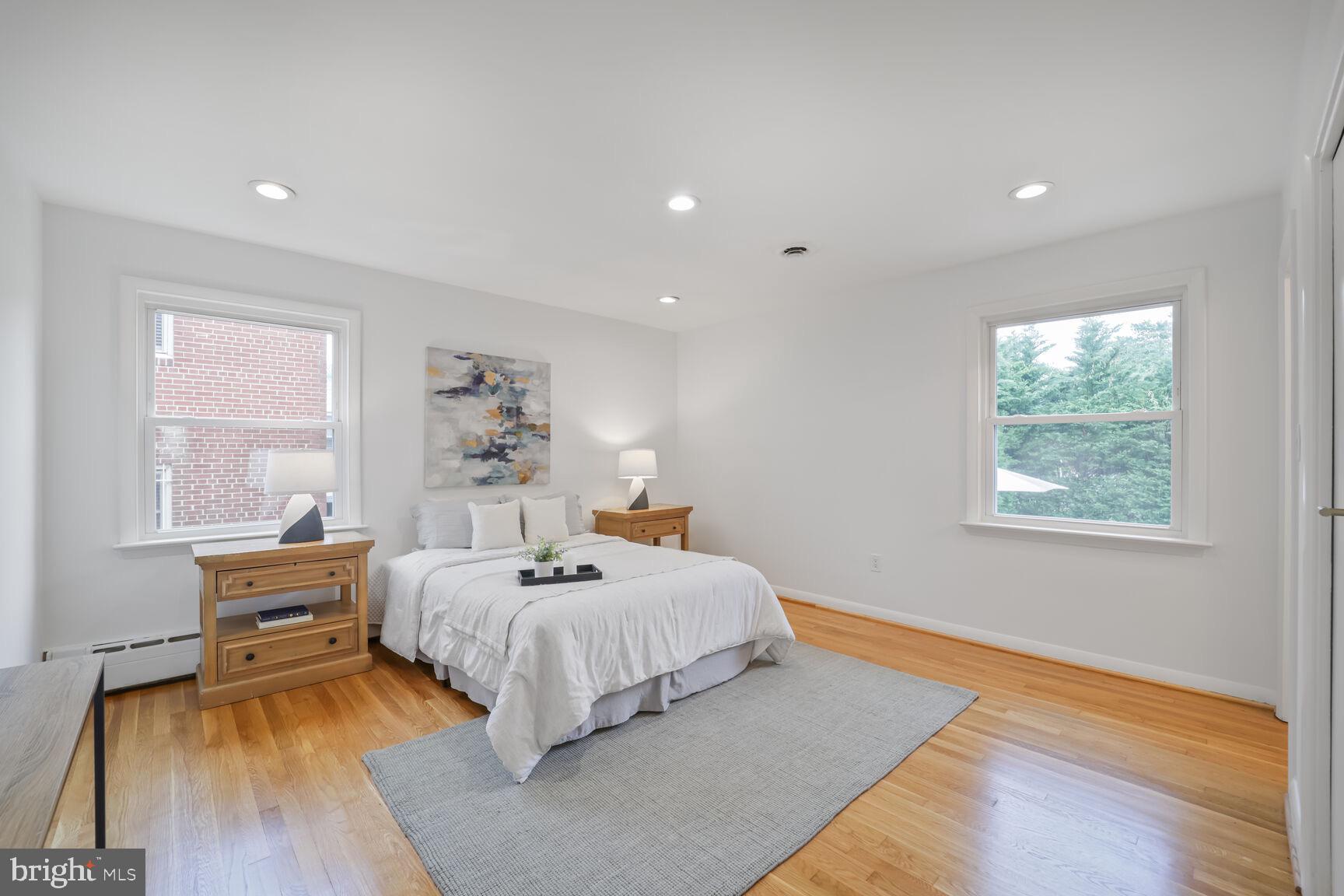 4609 22nd Avenue Mount Rainier, MD 20712 - Photo 10 of 33 a bedroom with a bed and wooden floor