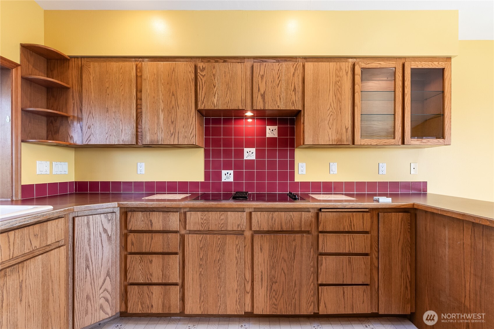 4139 Patos Road Ferndale, WA 98248 - Photo 16 of 39 a kitchen with wooden cabinets and a sink