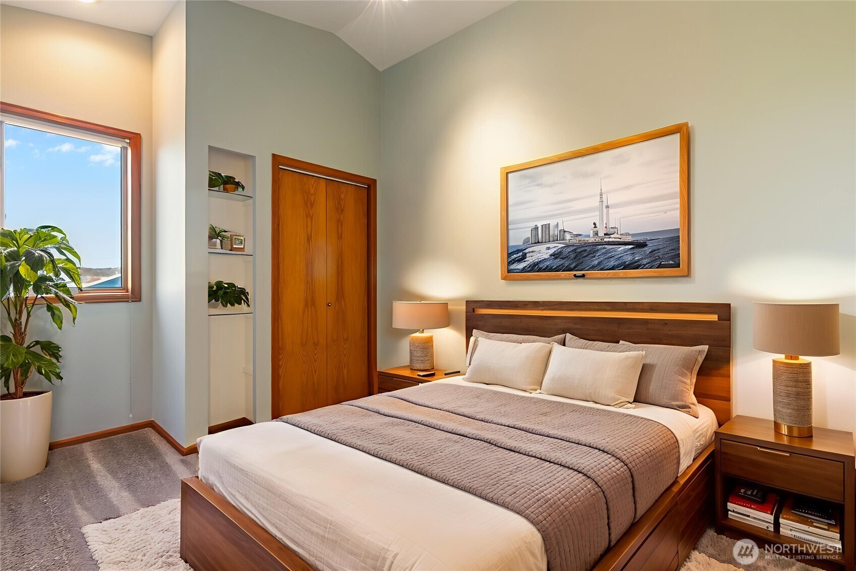 4139 Patos Road Ferndale, WA 98248 - Photo 17 of 39 a bedroom with a bed and a potted plant