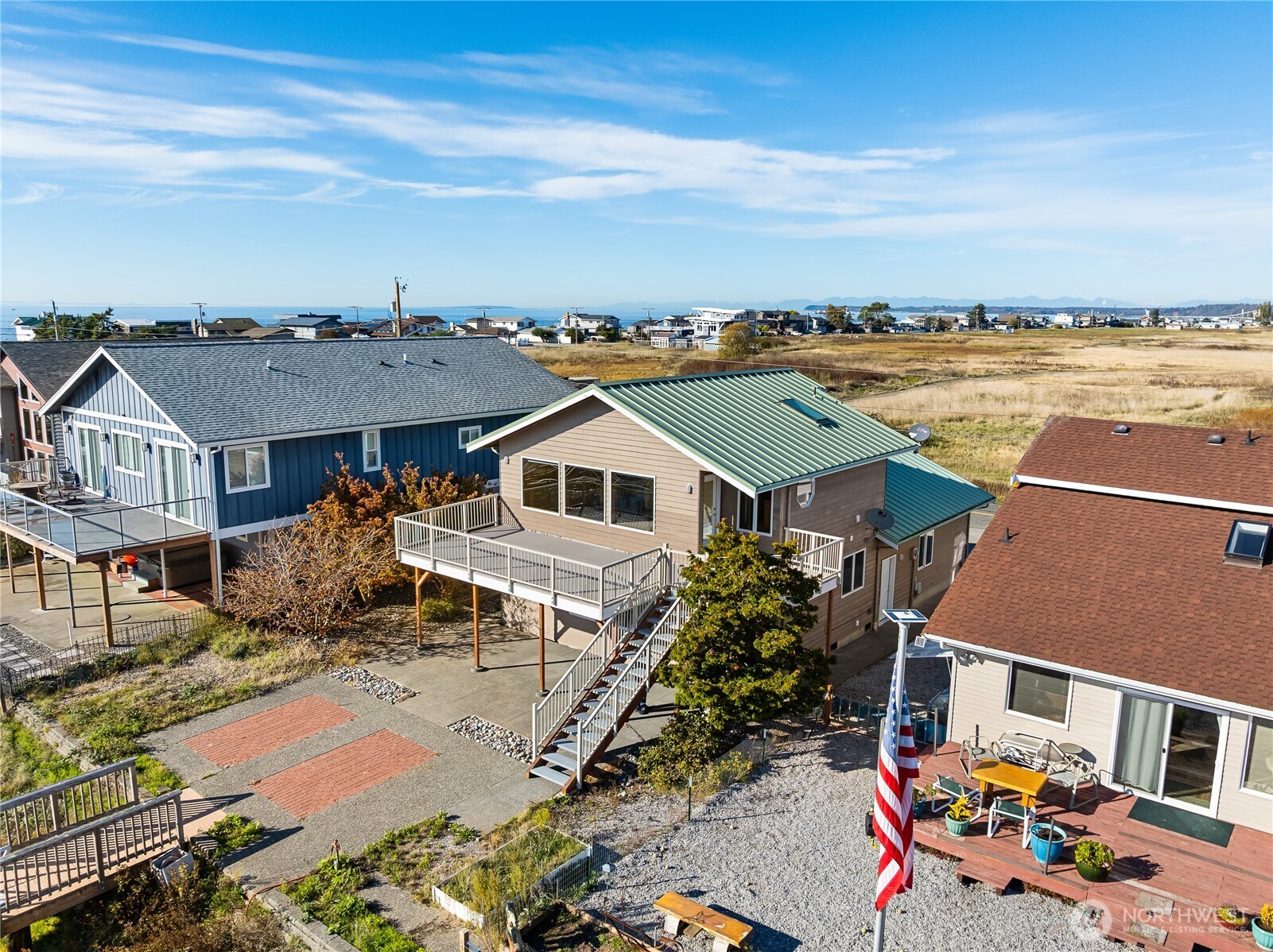 4139 Patos Road Ferndale, WA 98248 - Photo 2 of 39 an aerial view of multiple houses with a yard
