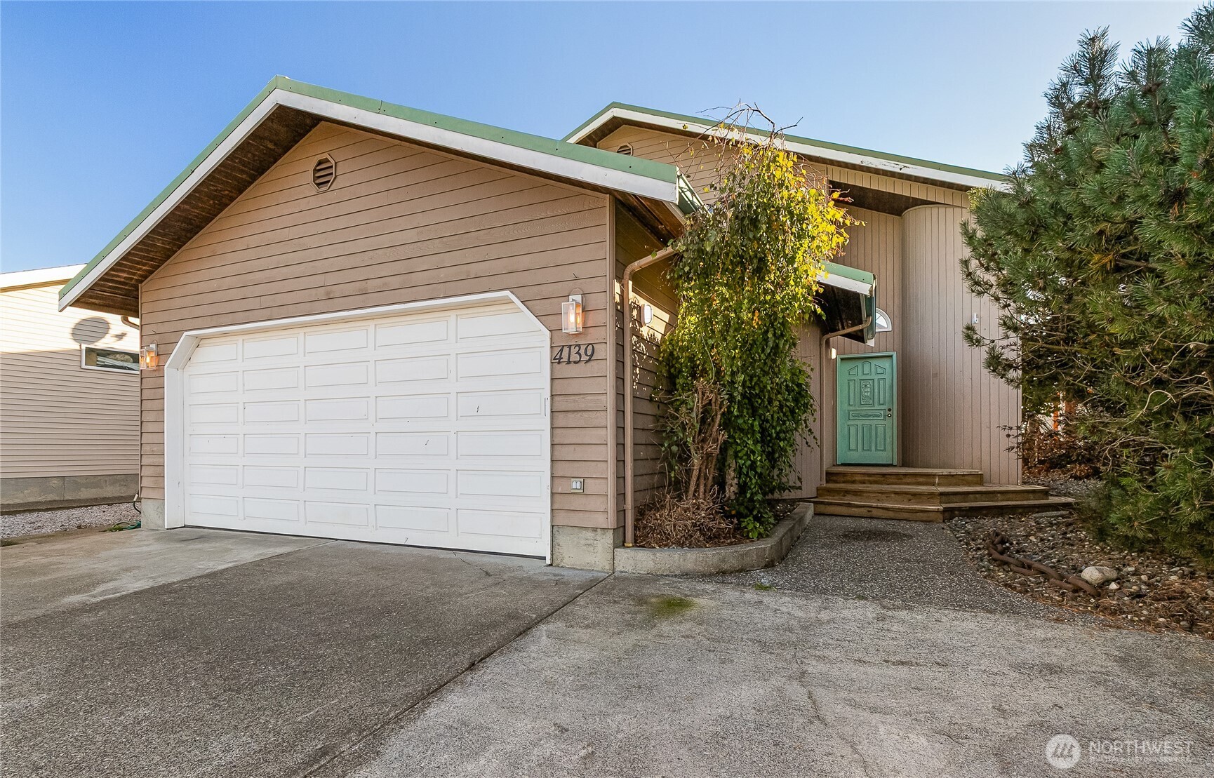 4139 Patos Road Ferndale, WA 98248 - Photo 4 of 39 a view of a house with a yard and garage