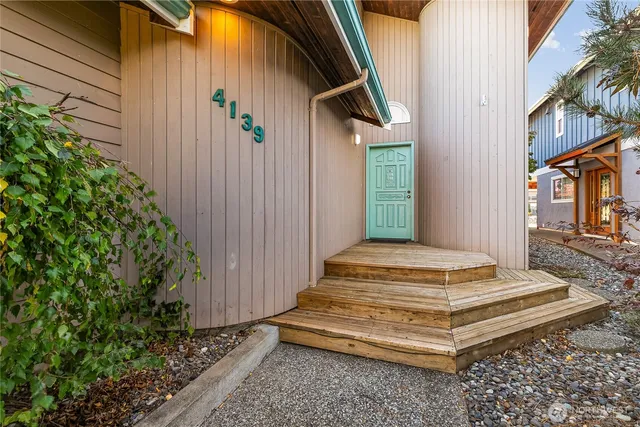 a view of backyard with patio