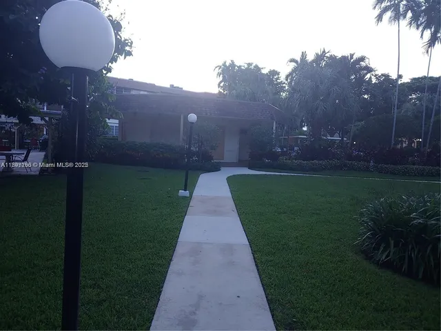 a view of a back yard of the house