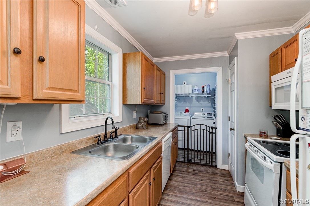 4255 Watson Road Sandy Hook, VA 23153 - Photo 12 of 27 a kitchen with a sink stove top oven and cabinets