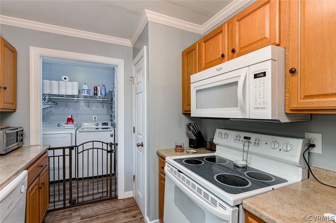 4255 Watson Road Sandy Hook, VA 23153 - Photo 13 of 27 a kitchen with a sink a stove and cabinets