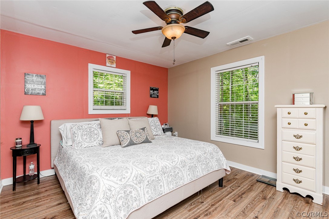 4255 Watson Road Sandy Hook, VA 23153 - Photo 15 of 27 a bedroom with a bed and a window