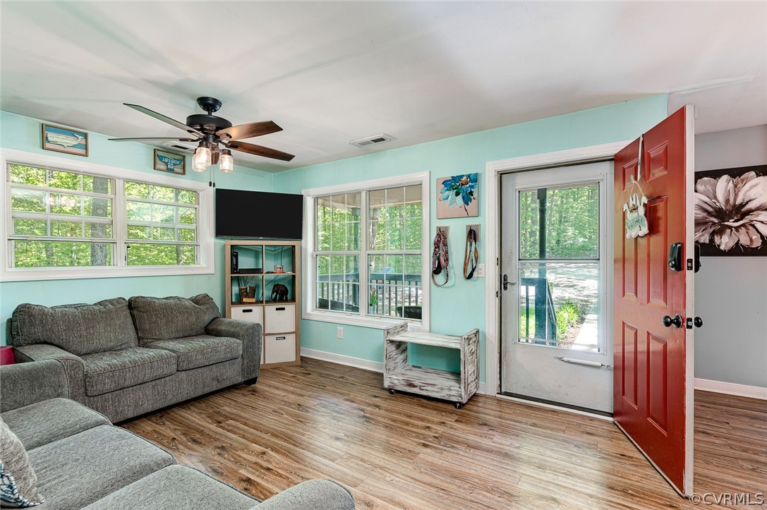 4255 Watson Road Sandy Hook, VA 23153 - Photo 5 of 27 a living room with furniture and a large window
