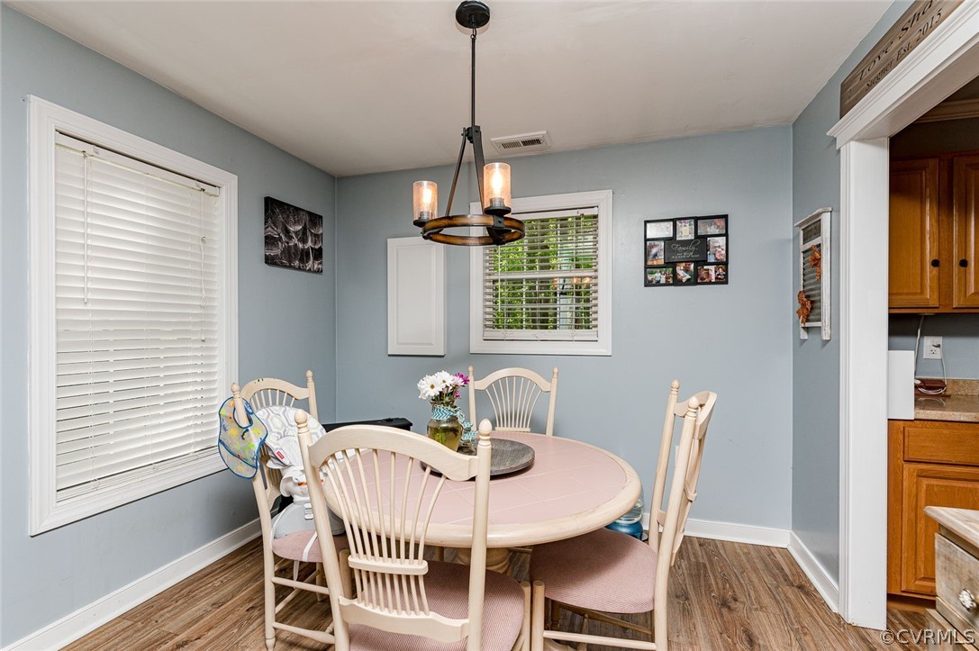 4255 Watson Road Sandy Hook, VA 23153 - Photo 8 of 27 a dining room with furniture and window