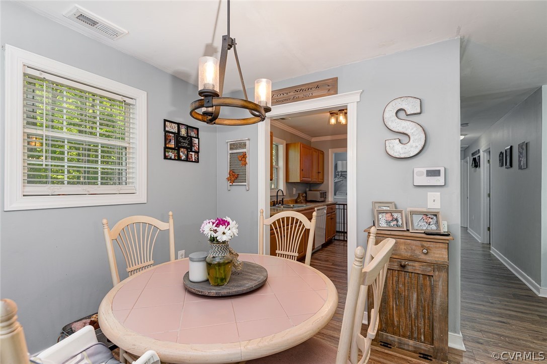 4255 Watson Road Sandy Hook, VA 23153 - Photo 9 of 27 a dining room with furniture and window