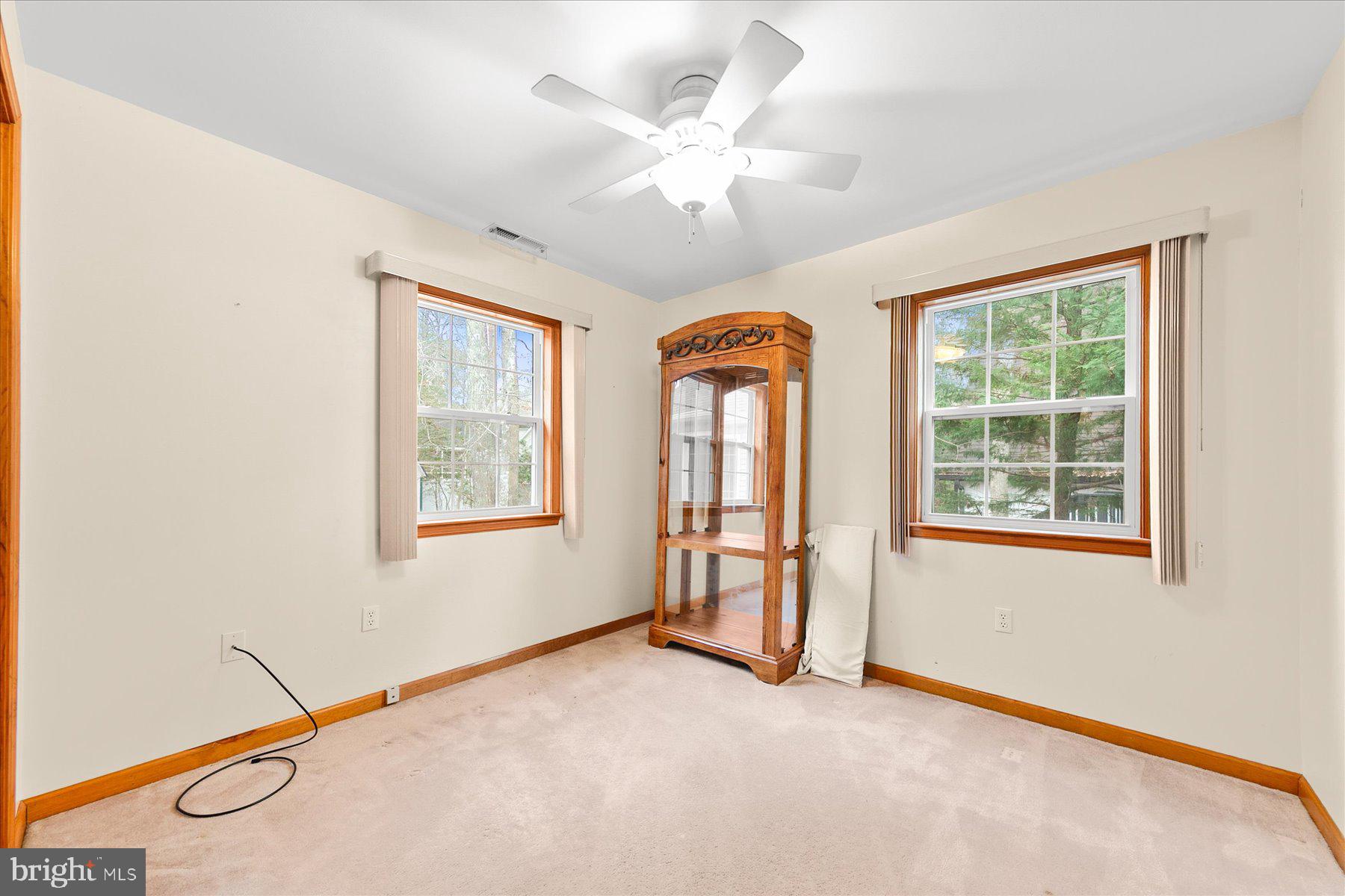50 King Richard Road Ocean Pines, MD 21811 - Photo 19 of 28 an empty room with windows and closet