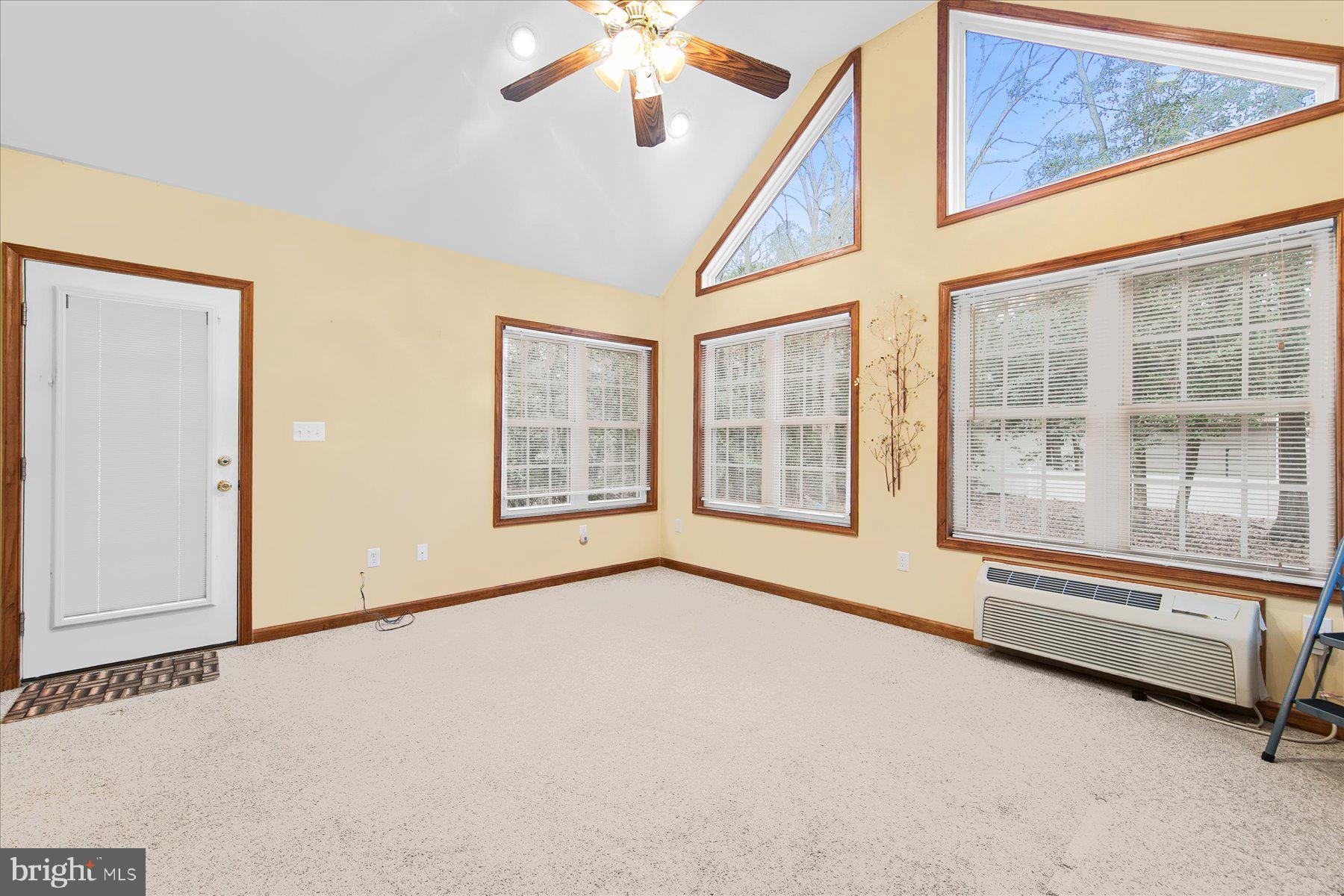 50 King Richard Road Ocean Pines, MD 21811 - Photo 4 of 28 a view of an empty room with a window