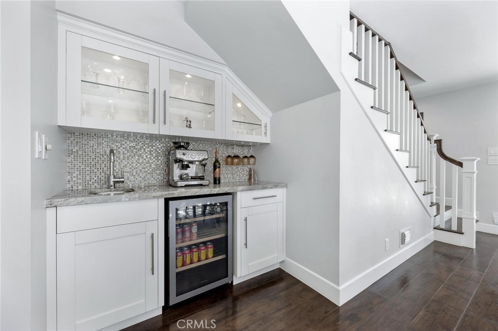 714 Avenue D Redondo Beach, CA 90277 - Photo 16 of 47 a kitchen with white cabinets and a stove