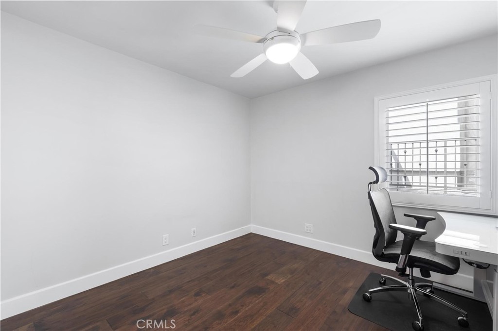 714 Avenue D Redondo Beach, CA 90277 - Photo 30 of 47 a view of a workspace with wooden floor and a window