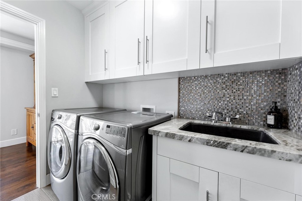 714 Avenue D Redondo Beach, CA 90277 - Photo 38 of 47 a kitchen with a sink and cabinets