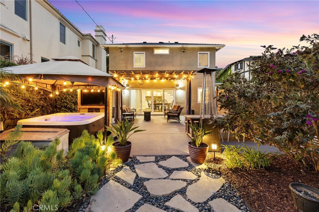 714 Avenue D Redondo Beach, CA 90277 - Photo 46 of 47 a view of a patio with table and chairs and potted plants