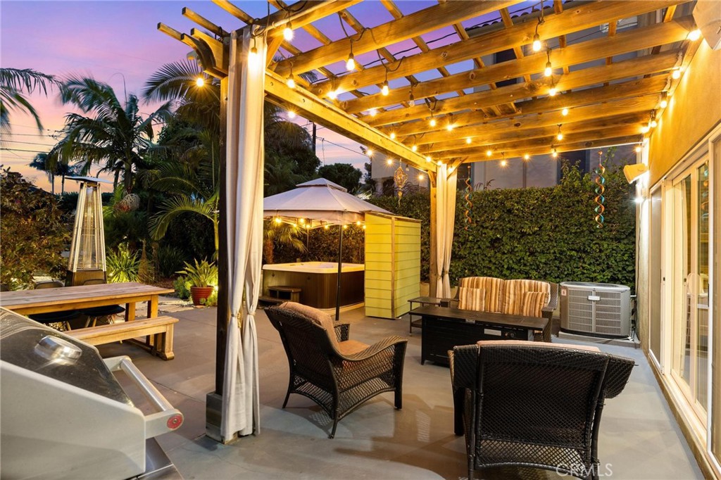 714 Avenue D Redondo Beach, CA 90277 - Photo 47 of 47 a view of an outdoor sitting area with furniture and barbeque grill with potted plants