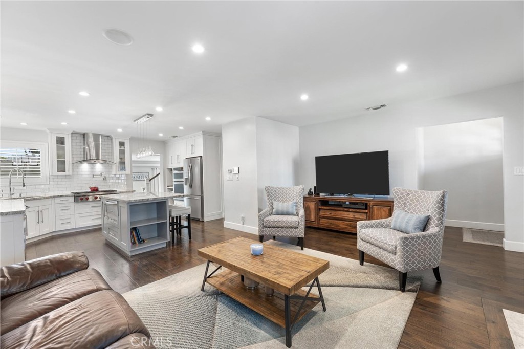 714 Avenue D Redondo Beach, CA 90277 - Photo 8 of 47 a living room with furniture and a flat screen tv