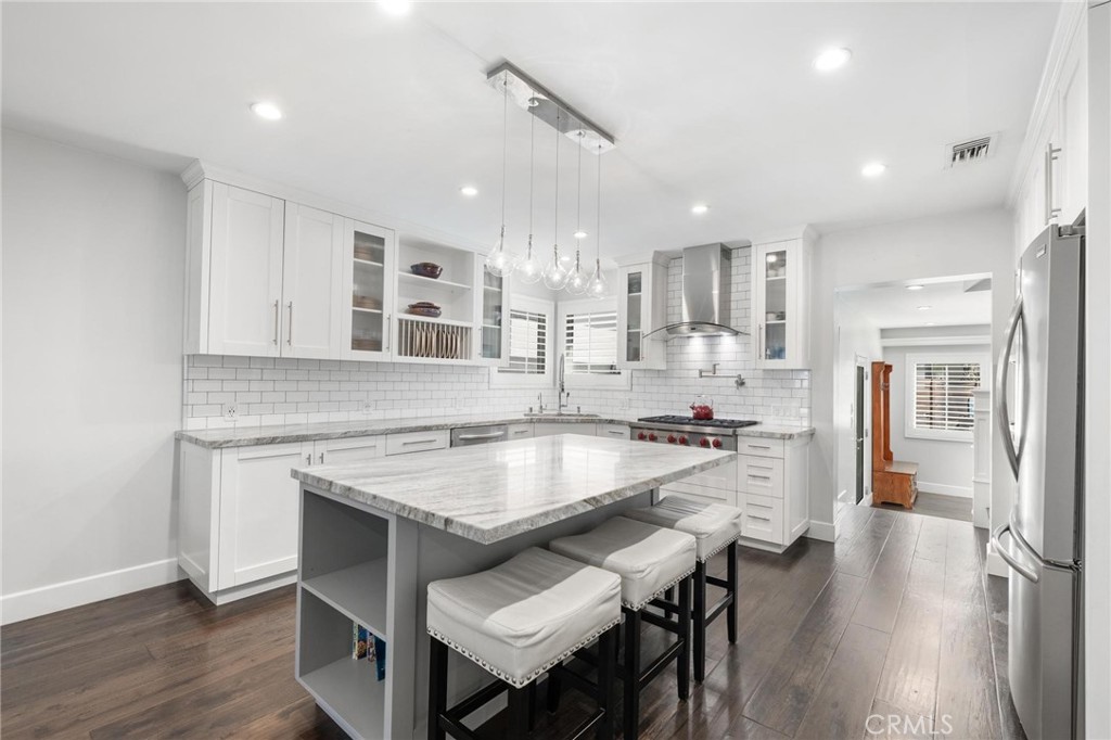 714 Avenue D Redondo Beach, CA 90277 - Photo 10 of 47 a kitchen with a table and chairs in it