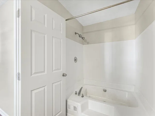 a bathroom with a bathtub