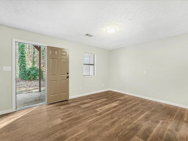 an empty room with windows