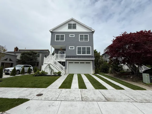 a front view of building with yard