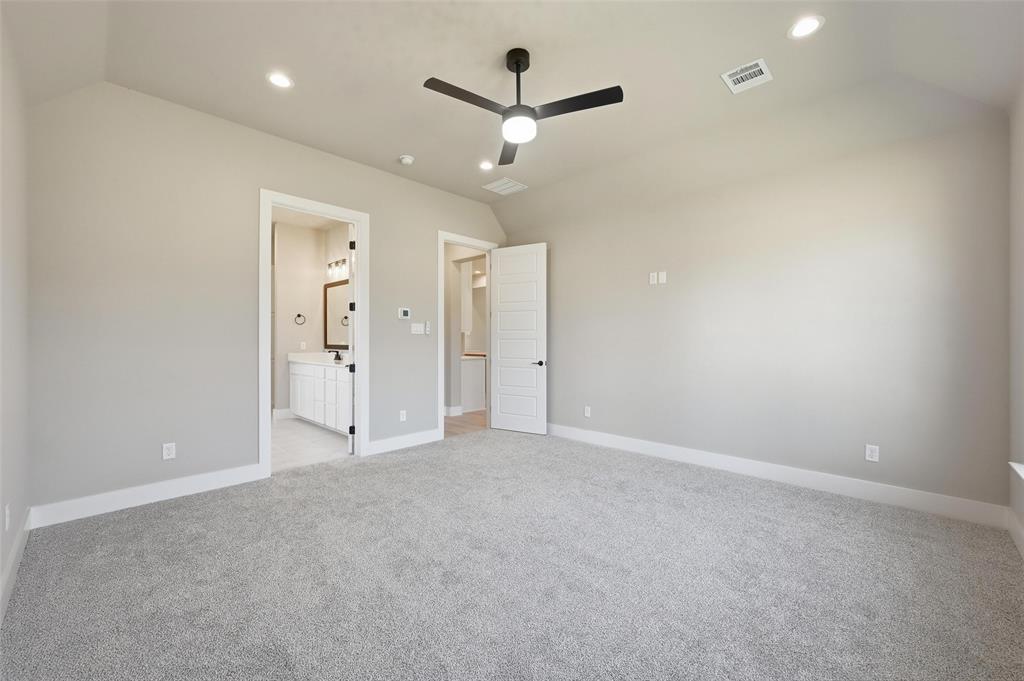 1053 Llano Way Poolville, TX 76487 - Photo 28 of 40 an empty room with ceiling fan and window