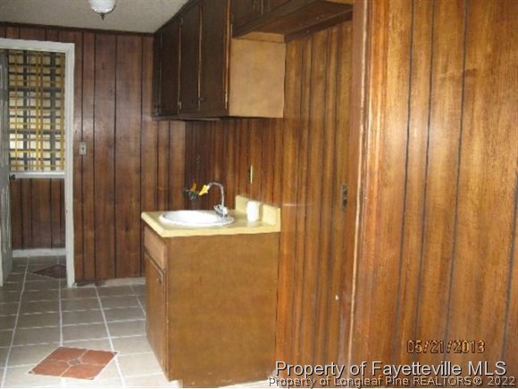 2391 Wrench Road Godwin, NC 28344 - Photo 8 of 10 a bathroom with a sink and a mirror