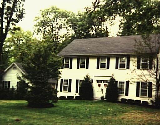 5 Cornell Road New Fairfield, CT 06812 - Photo 1 of 1 a front view of a house with a garden