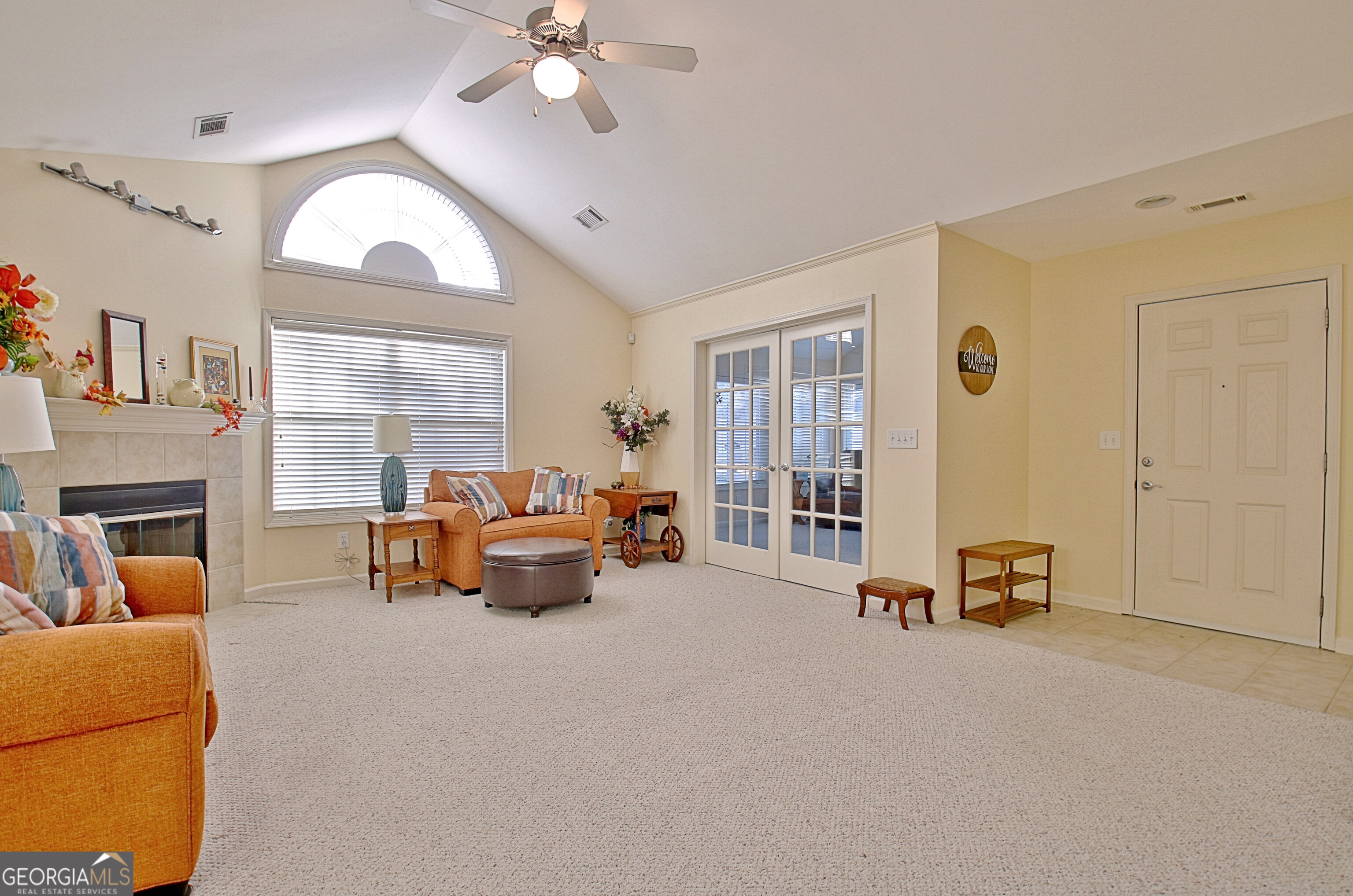 265 Rehobeth Way Fayetteville, GA 30214 - Photo 14 of 63 a view of livingroom with furniture and a ceiling fan