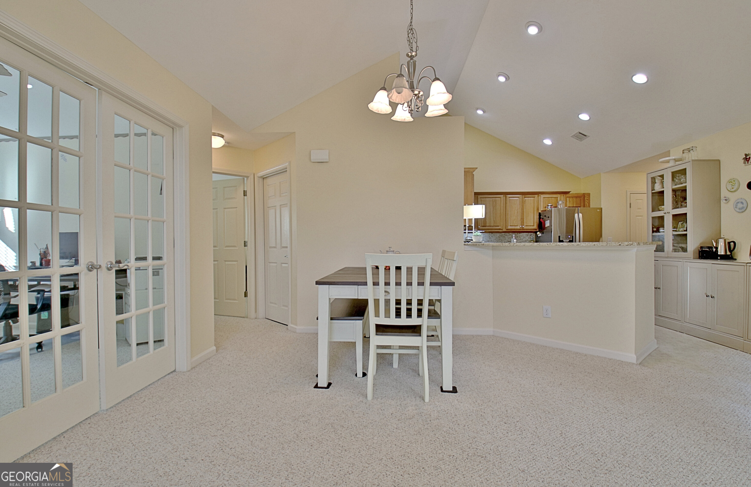 265 Rehobeth Way Fayetteville, GA 30214 - Photo 19 of 63 a view of kitchen with furniture and chandelier