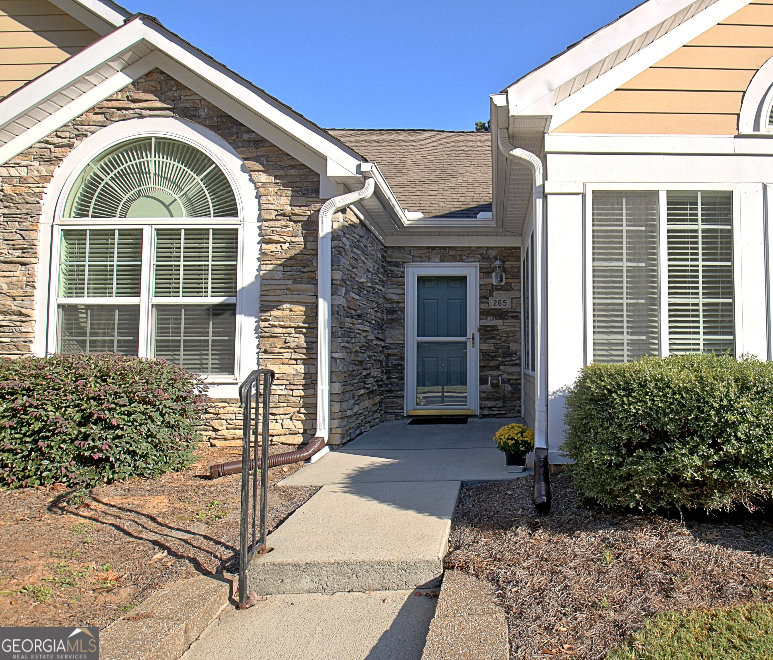 265 Rehobeth Way Fayetteville, GA 30214 - Photo 2 of 63 a front view of a house with a porch