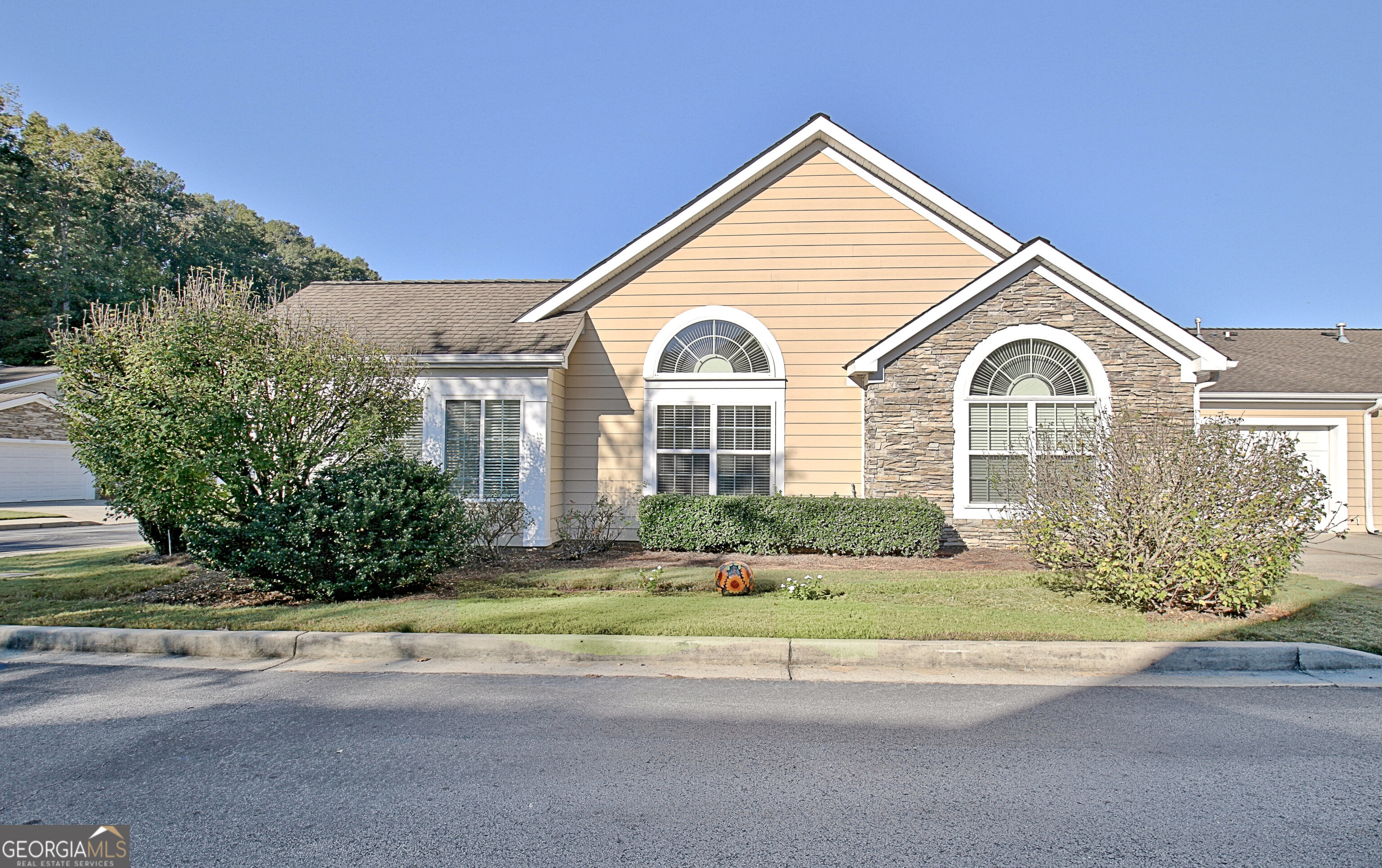 265 Rehobeth Way Fayetteville, GA 30214 - Photo 49 of 63 a front view of a house with a yard