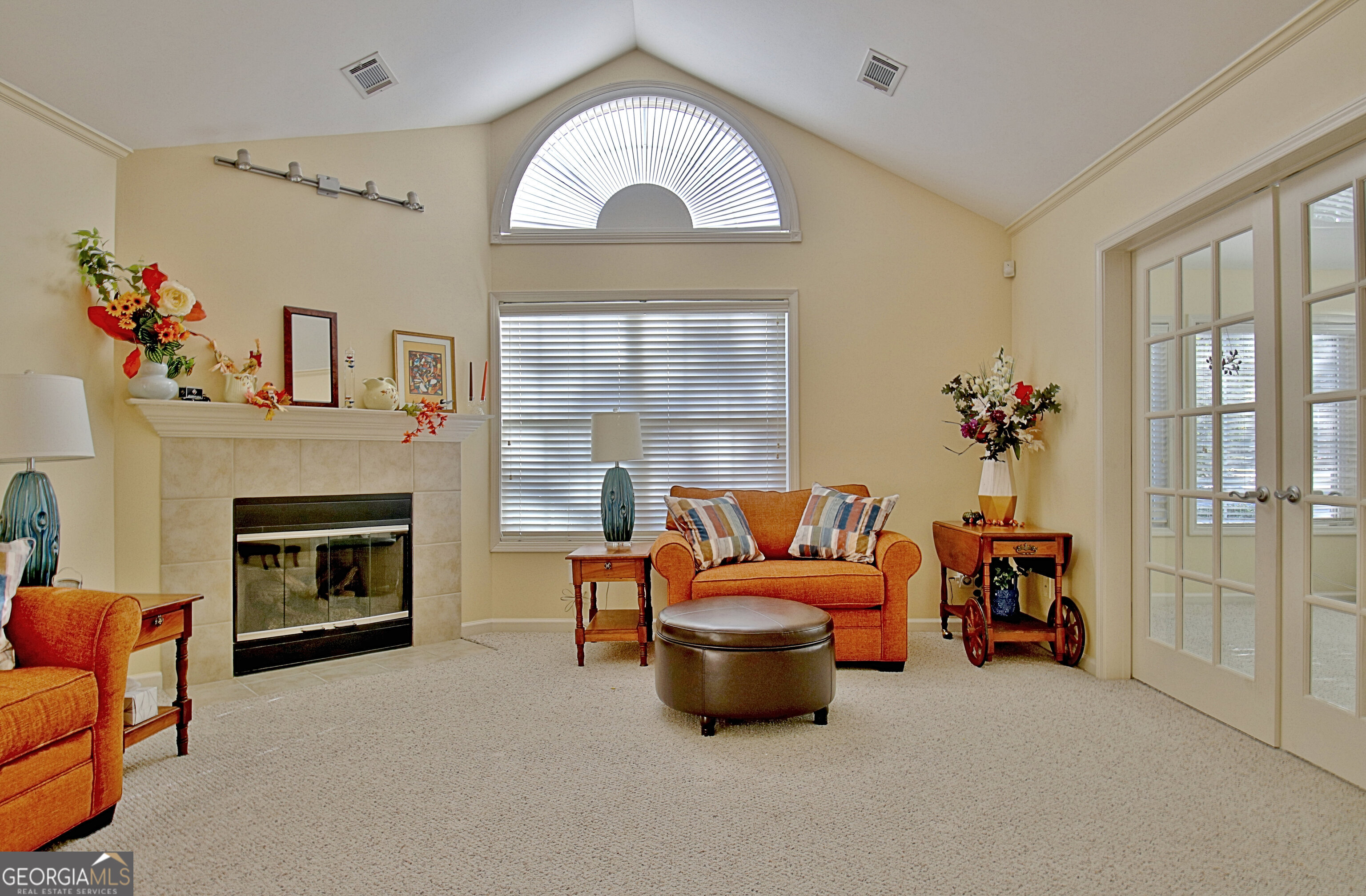 265 Rehobeth Way Fayetteville, GA 30214 - Photo 5 of 63 a living room with furniture and a fireplace