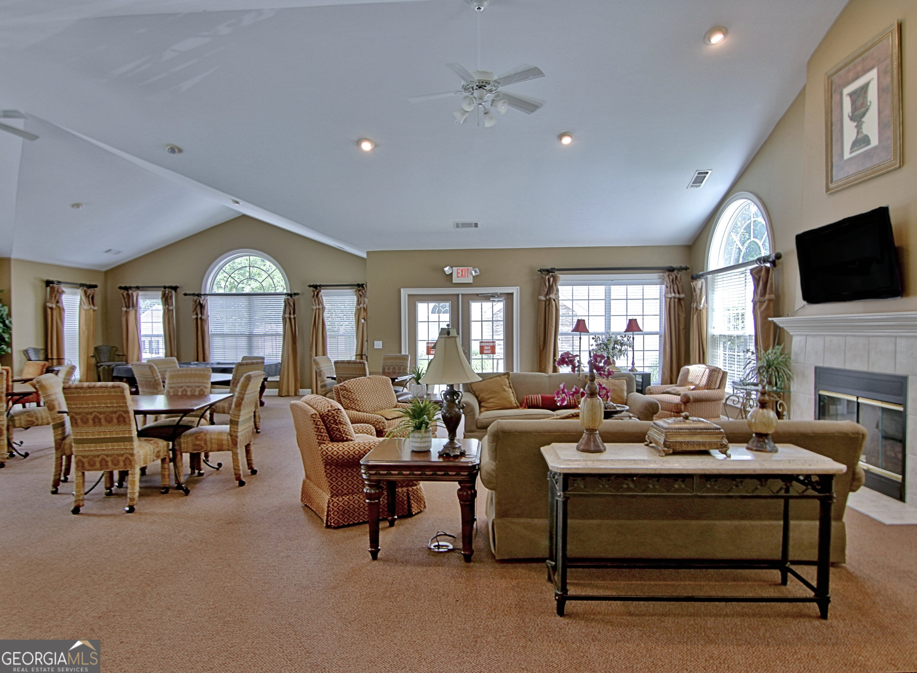 265 Rehobeth Way Fayetteville, GA 30214 - Photo 54 of 63 a living room with furniture fireplace and a flat screen tv