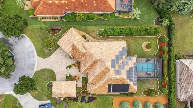 a aerial view of a house with garden