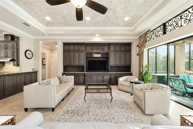 a kitchen with stainless steel appliances granite countertop sink stove and refrigerator