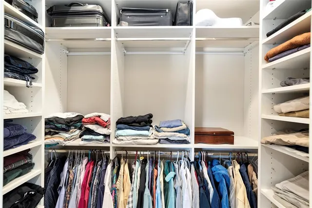 a view of a patio with a dining table and chairs