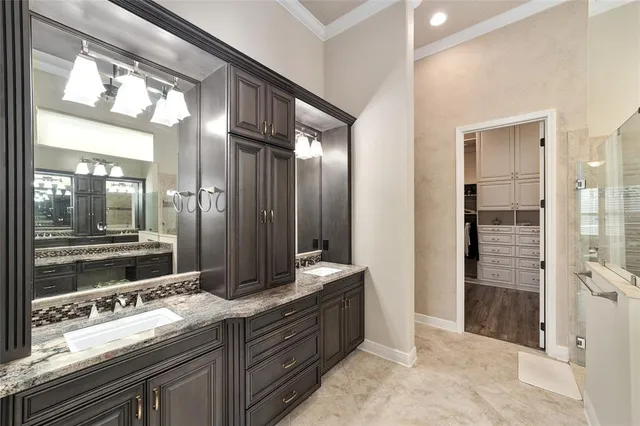 a bedroom with furniture and wooden floor