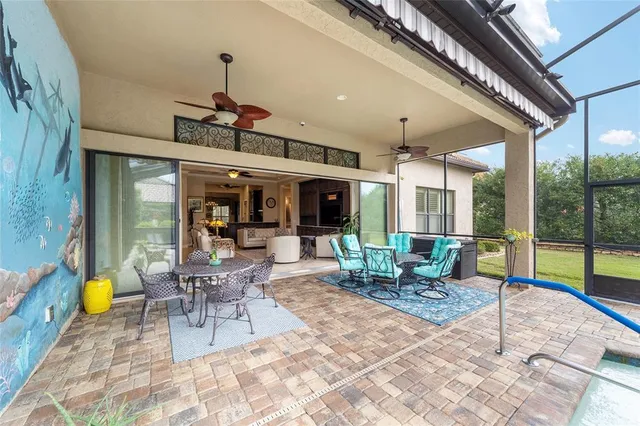 an aerial view of a house with a ocean view
