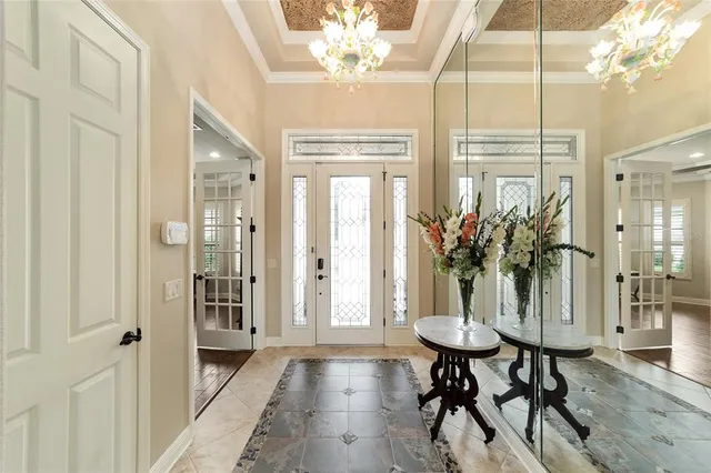 a view of a dining room and chandelier